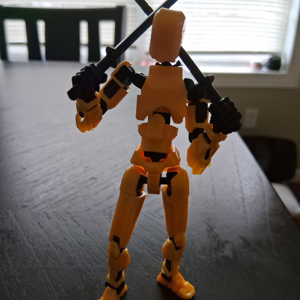 JustFab Yellow Action Figure